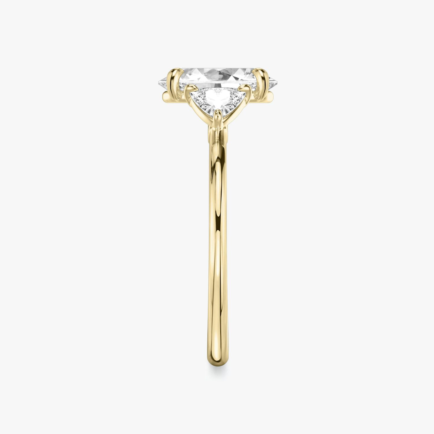 The Three Stone | Oval | 18k | 18k Yellow Gold | Band: Plain | Side stone carat: 1/4 | Side stone shape: Trillion | Diamond orientation: vertical | Carat weight: See full inventory