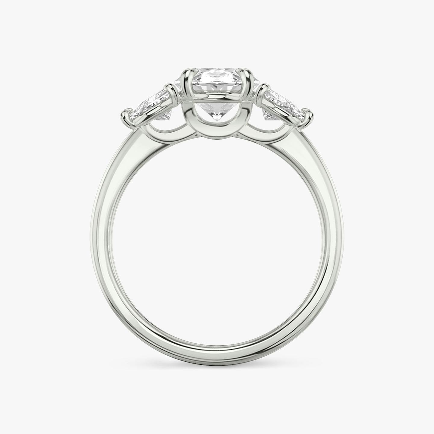 The Three Stone | Oval | 18k | 18k White Gold | Band: Plain | Side stone carat: 1/4 | Side stone shape: Trillion | Diamond orientation: vertical | Carat weight: See full inventory