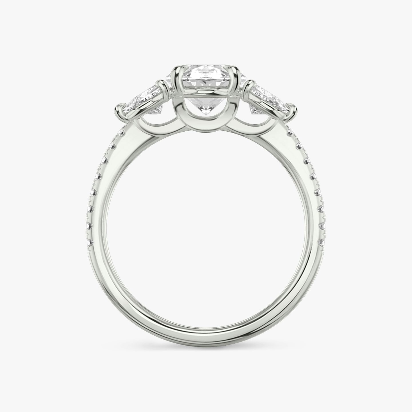 The Three Stone | Oval | 18k | 18k White Gold | Band: Pavé | Side stone carat: 1/4 | Side stone shape: Trillion | Diamond orientation: vertical | Carat weight: See full inventory