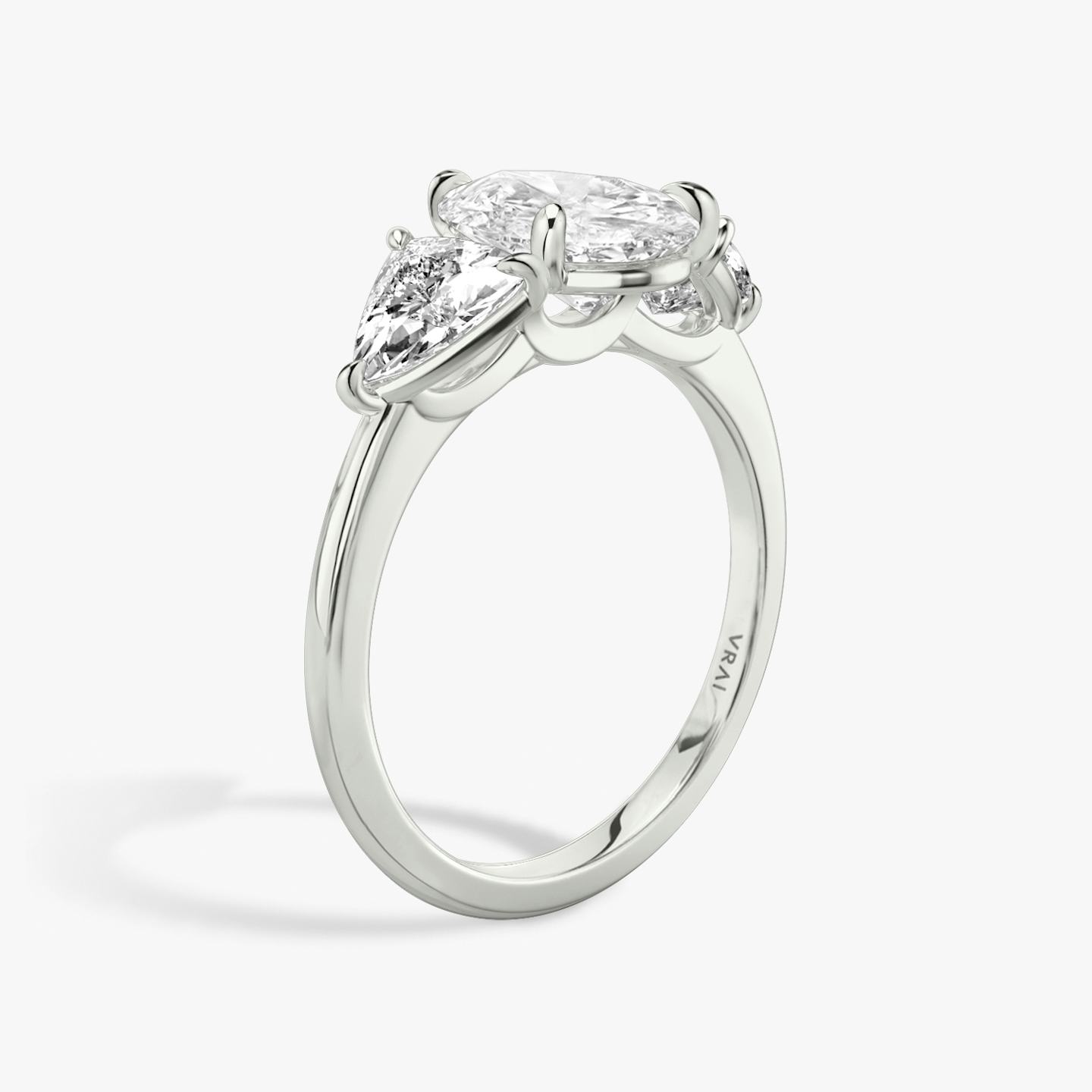 The Three Stone | Pear | 18k | 18k White Gold | Band: Plain | Side stone carat: 1/2 | Side stone shape: Trillion | Diamond orientation: vertical | Carat weight: See full inventory