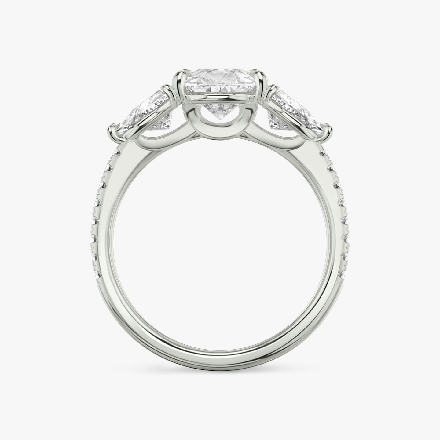 The Three Stone | Pear | 18k | 18k White Gold | Band: Pavé | Side stone carat: 1/2 | Side stone shape: Trillion | Diamond orientation: vertical | Carat weight: See full inventory