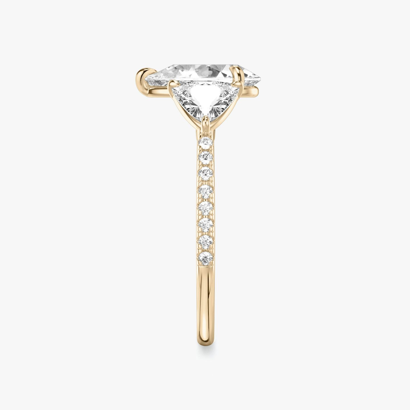 The Three Stone | Pear | 14k | 14k Rose Gold | Band: Pavé | Side stone carat: 1/2 | Side stone shape: Trillion | Diamond orientation: vertical | Carat weight: See full inventory