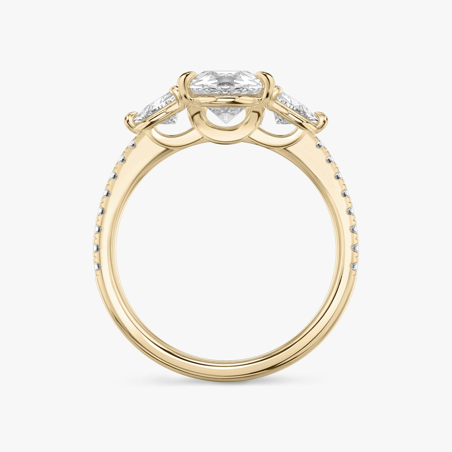 The Three Stone | Pear | 14k | 14k Rose Gold | Band: Pavé | Side stone carat: 1/4 | Side stone shape: Trillion | Diamond orientation: vertical | Carat weight: See full inventory
