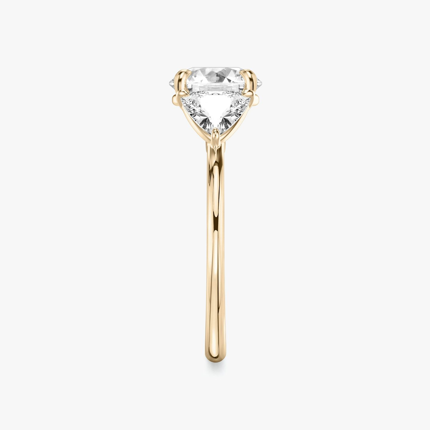 The Three Stone | Round Brilliant | 14k | 14k Rose Gold | Band: Plain | Carat weight: See full inventory | Side stone carat: 1/2 | Side stone shape: Trillion | Diamond orientation: vertical