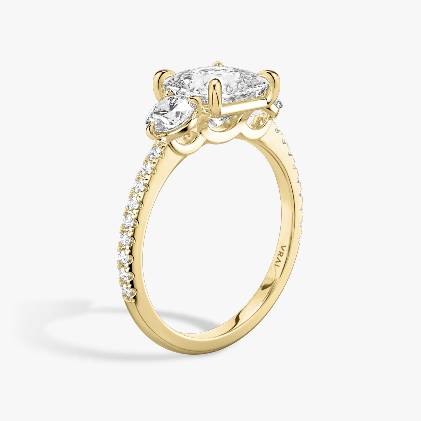 The Three Stone | Princess | 18k | 18k Yellow Gold | Band: Pavé | Side stone carat: 1/4 | Side stone shape: Round Brilliant | Diamond orientation: vertical | Carat weight: See full inventory
