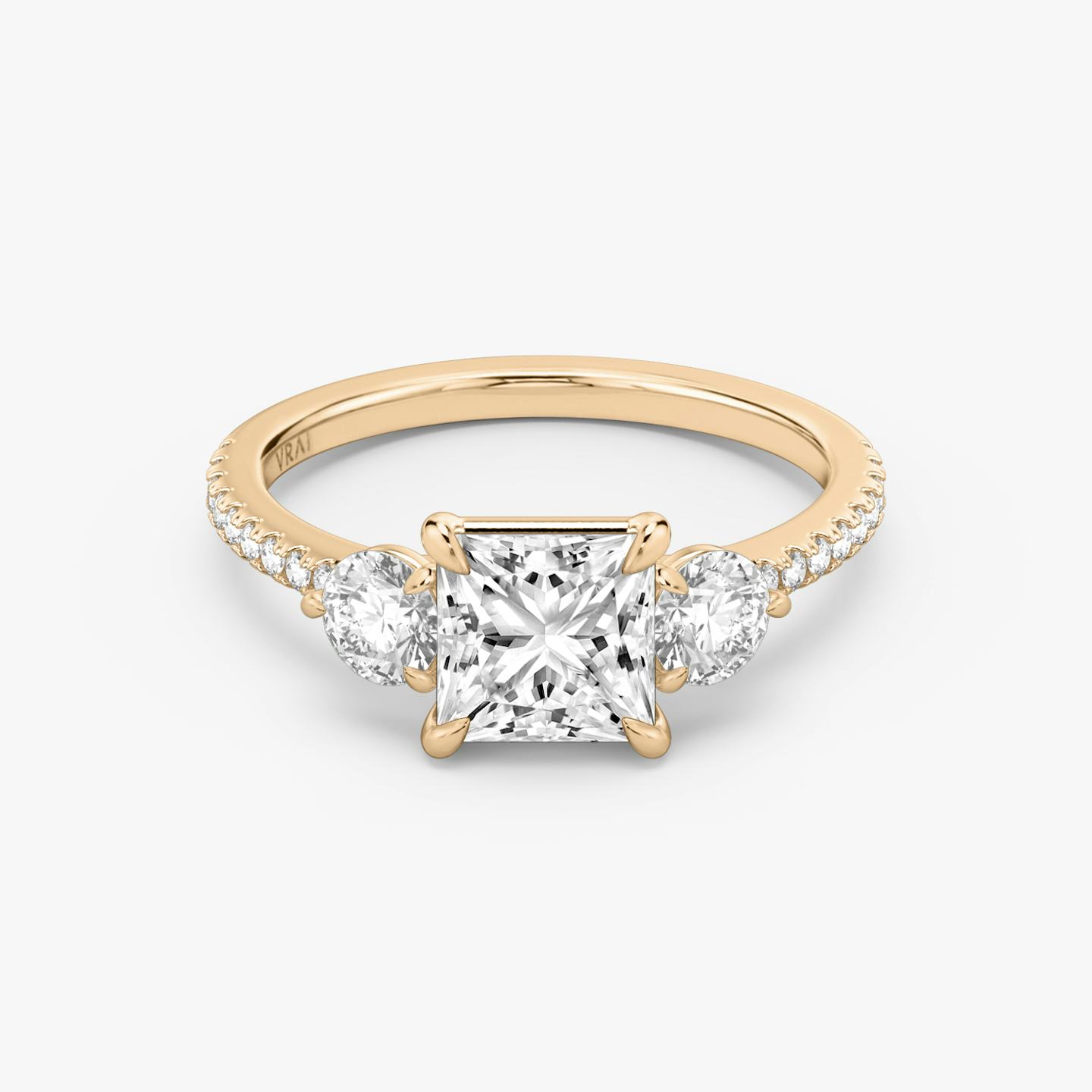 The Three Stone | Princess | 14k | 14k Rose Gold | Band: Pavé | Side stone carat: 1/4 | Side stone shape: Round Brilliant | Diamond orientation: vertical | Carat weight: See full inventory