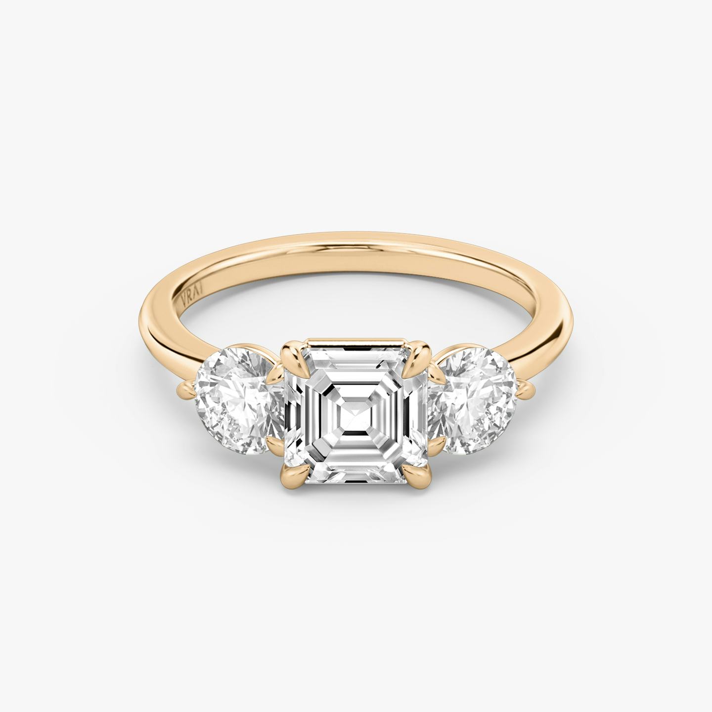 The Three Stone | Asscher | 14k | 14k Rose Gold | Band: Plain | Side stone carat: 1/2 | Side stone shape: Round Brilliant | Diamond orientation: vertical | Carat weight: See full inventory