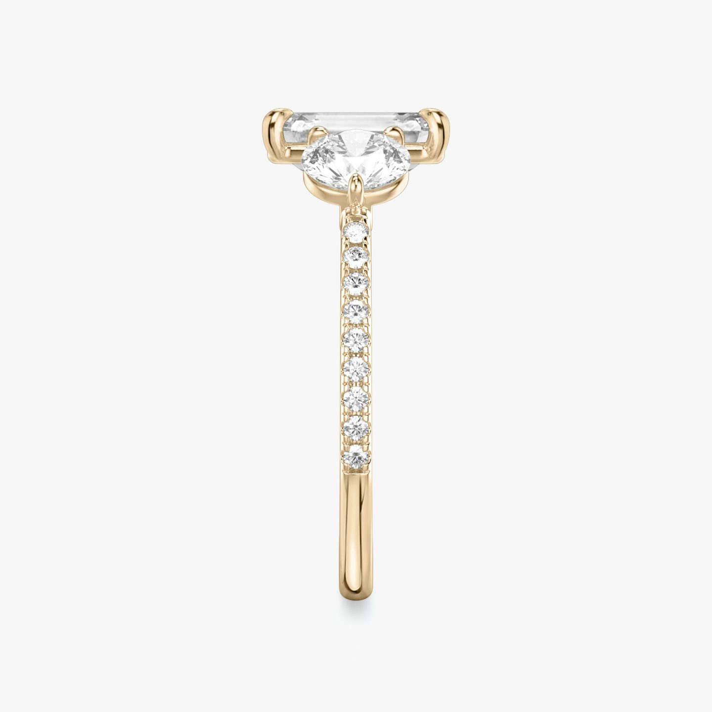 The Three Stone | Emerald | 14k | 14k Rose Gold | Band: Pavé | Side stone carat: 1/2 | Side stone shape: Round Brilliant | Diamond orientation: vertical | Carat weight: See full inventory