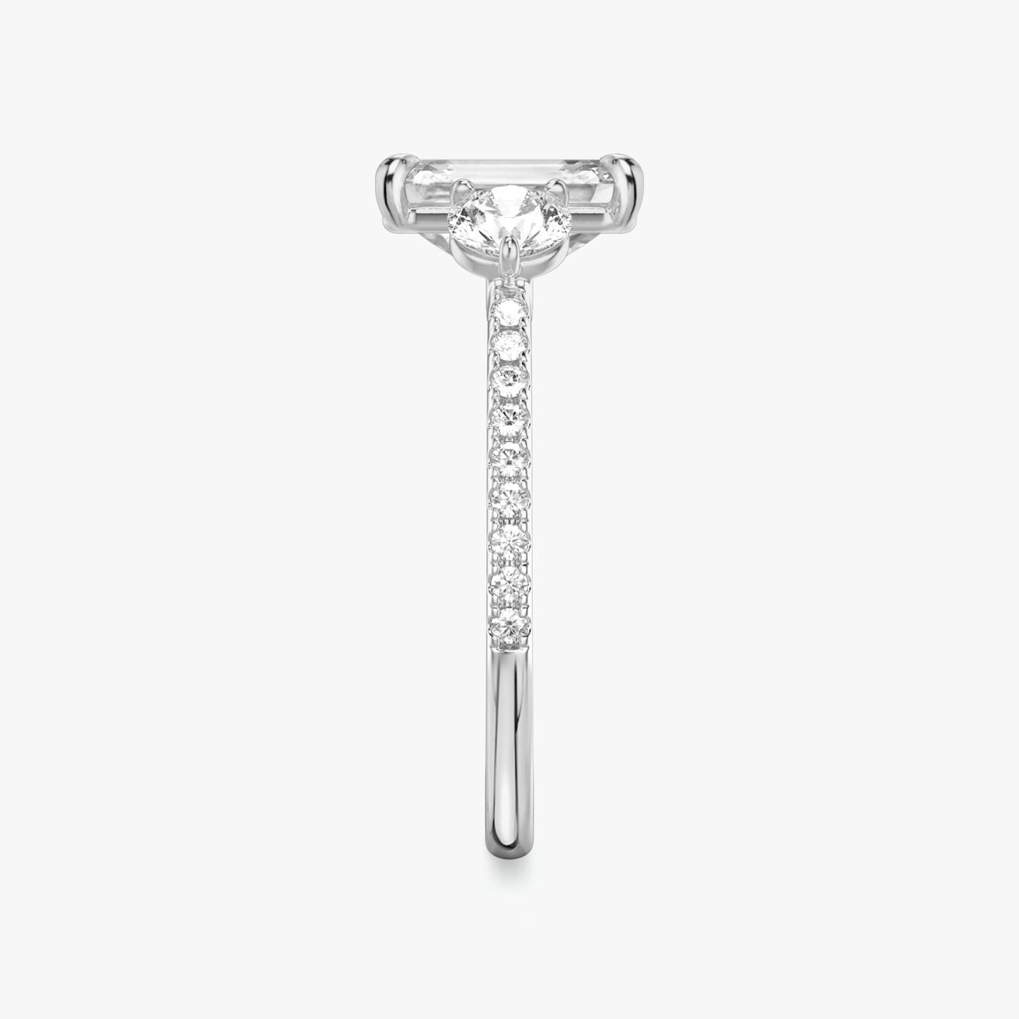 The Three Stone | Emerald | 18k | 18k White Gold | Band: Pavé | Side stone carat: 1/4 | Side stone shape: Round Brilliant | Diamond orientation: vertical | Carat weight: See full inventory