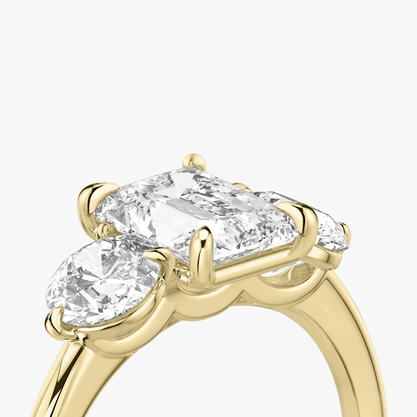 The Three Stone | Radiant | 18k | 18k Yellow Gold | Band: Plain | Side stone carat: 1/2 | Side stone shape: Round Brilliant | Diamond orientation: vertical | Carat weight: See full inventory