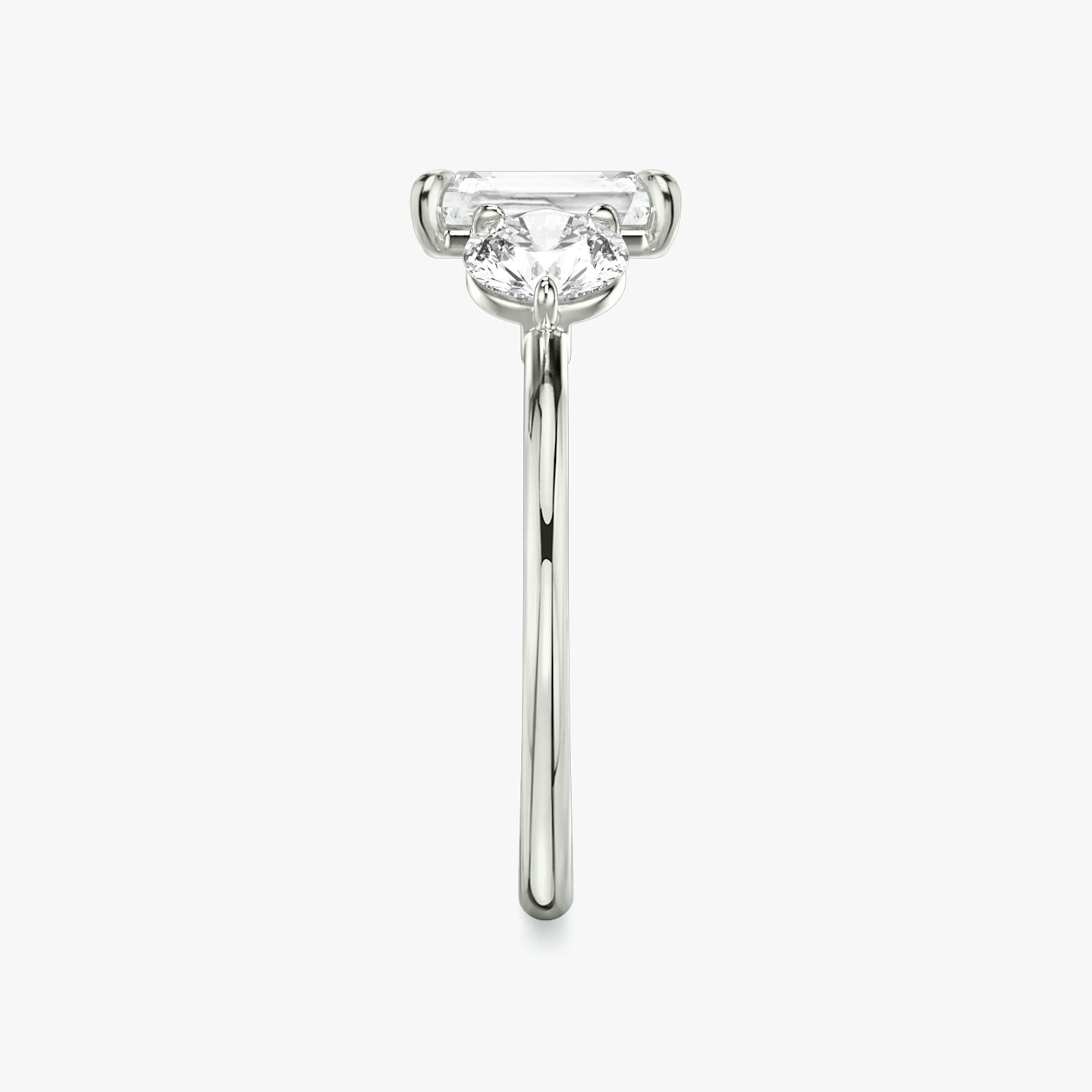 The Three Stone | Radiant | 18k | 18k White Gold | Band: Plain | Side stone carat: 1/2 | Side stone shape: Round Brilliant | Diamond orientation: vertical | Carat weight: See full inventory