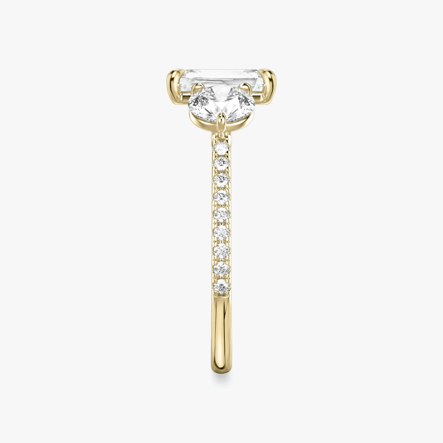The Three Stone | Radiant | 18k | 18k Yellow Gold | Band: Pavé | Side stone carat: 1/2 | Side stone shape: Round Brilliant | Diamond orientation: vertical | Carat weight: See full inventory