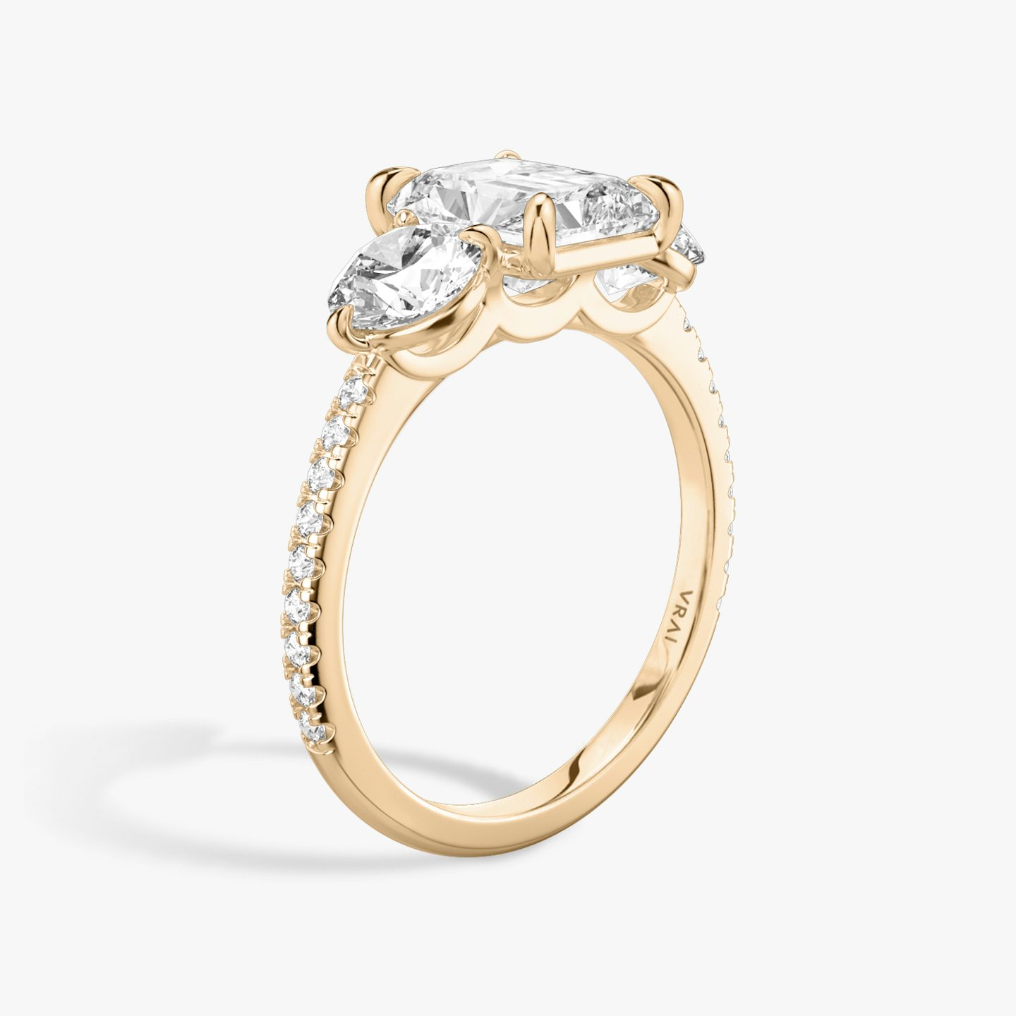 The Three Stone | Radiant | 14k | 14k Rose Gold | Band: Pavé | Side stone carat: 1/2 | Side stone shape: Round Brilliant | Diamond orientation: vertical | Carat weight: See full inventory