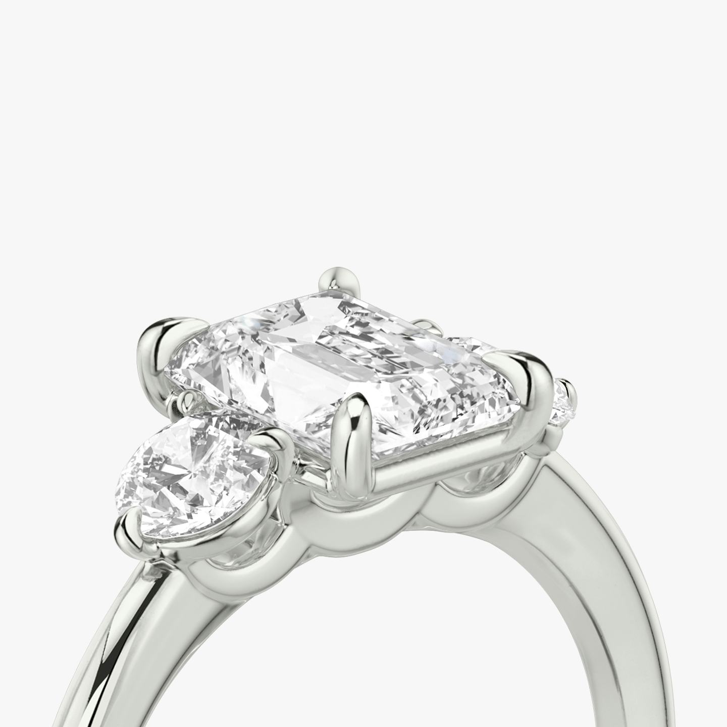 The Three Stone | Radiant | 18k | 18k White Gold | Band: Plain | Side stone carat: 1/4 | Side stone shape: Round Brilliant | Diamond orientation: vertical | Carat weight: See full inventory