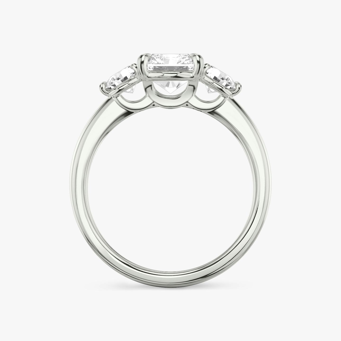 The Three Stone | Radiant | 18k | 18k White Gold | Band: Plain | Side stone carat: 1/4 | Side stone shape: Round Brilliant | Diamond orientation: vertical | Carat weight: See full inventory