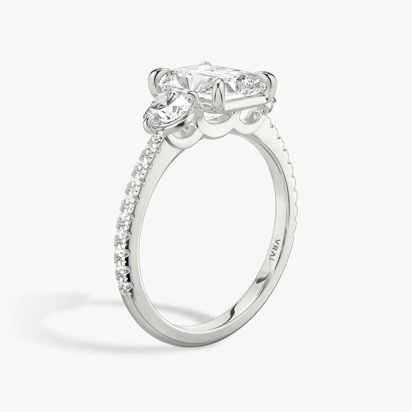 The Three Stone | Radiant | 18k | 18k White Gold | Band: Pavé | Side stone carat: 1/4 | Side stone shape: Round Brilliant | Diamond orientation: vertical | Carat weight: See full inventory
