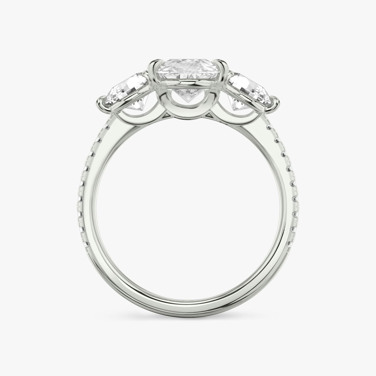 The Three Stone | Pear | 18k | 18k White Gold | Band: Pavé | Side stone carat: 1/2 | Side stone shape: Round Brilliant | Diamond orientation: vertical | Carat weight: See full inventory