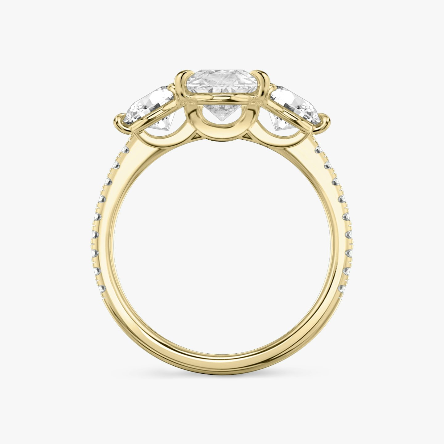 The Three Stone | Pear | 18k | 18k Yellow Gold | Band: Pavé | Side stone carat: 1/2 | Side stone shape: Round Brilliant | Diamond orientation: vertical | Carat weight: See full inventory