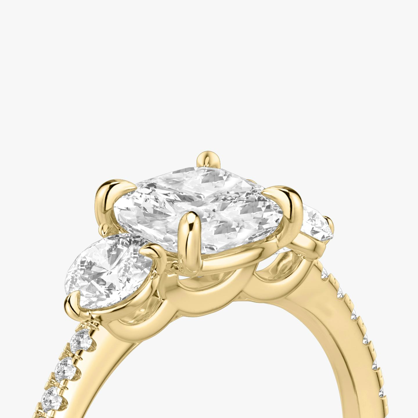 The Three Stone | Pavé Cushion | 18k | 18k Yellow Gold | Band: Pavé | Side stone carat: 1/4 | Side stone shape: Round Brilliant | Diamond orientation: vertical | Carat weight: See full inventory