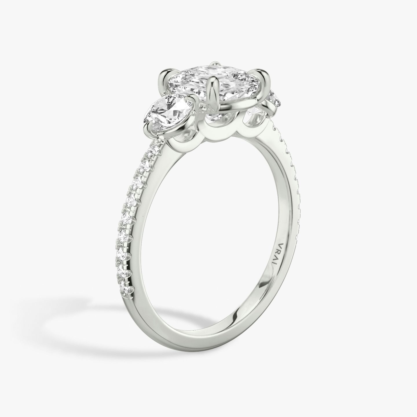 The Three Stone | Pavé Cushion | 18k | 18k White Gold | Band: Pavé | Side stone carat: 1/4 | Side stone shape: Round Brilliant | Diamond orientation: vertical | Carat weight: See full inventory