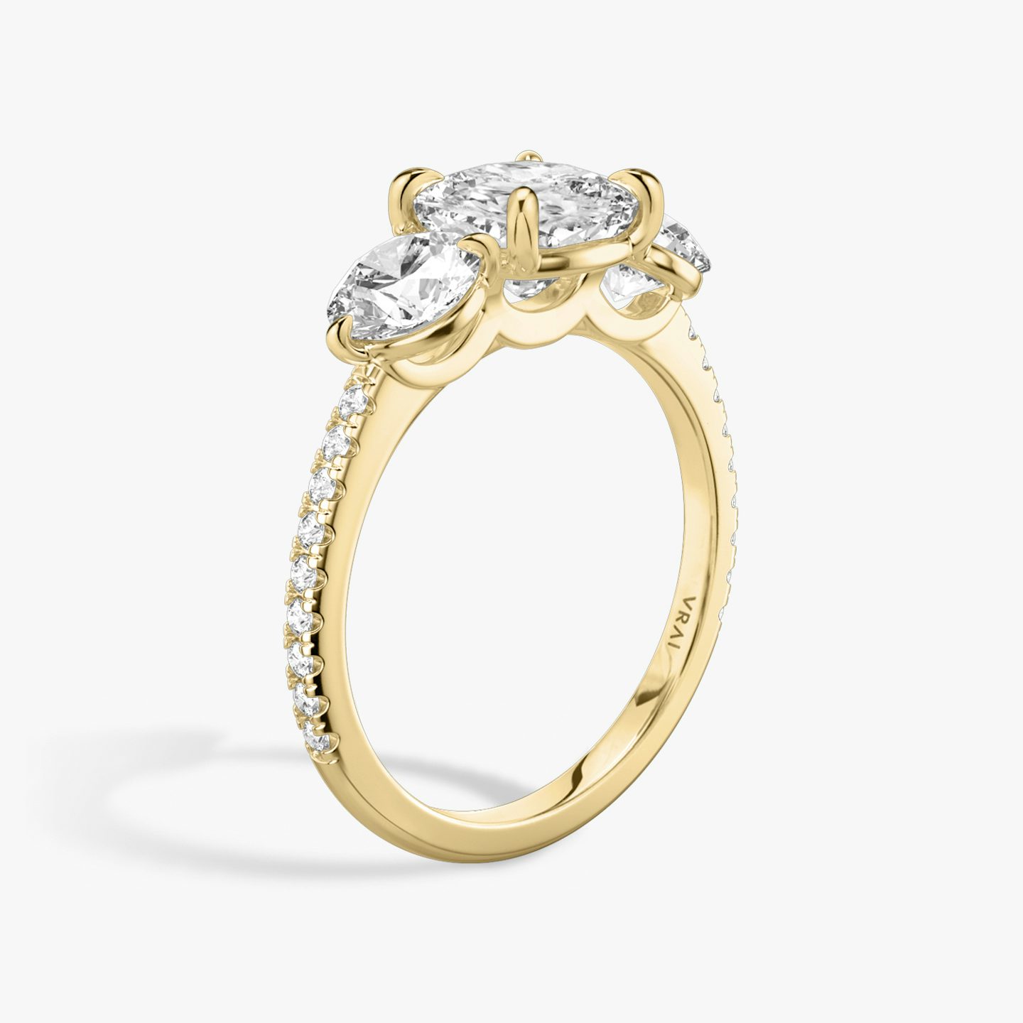 The Three Stone | Pavé Cushion | 18k | 18k Yellow Gold | Band: Pavé | Side stone carat: 1/2 | Side stone shape: Round Brilliant | Diamond orientation: vertical | Carat weight: See full inventory