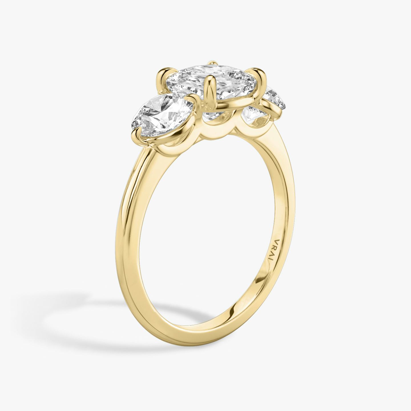 The Three Stone | Pavé Cushion | 18k | 18k Yellow Gold | Band: Plain | Side stone carat: 1/2 | Side stone shape: Round Brilliant | Diamond orientation: vertical | Carat weight: See full inventory