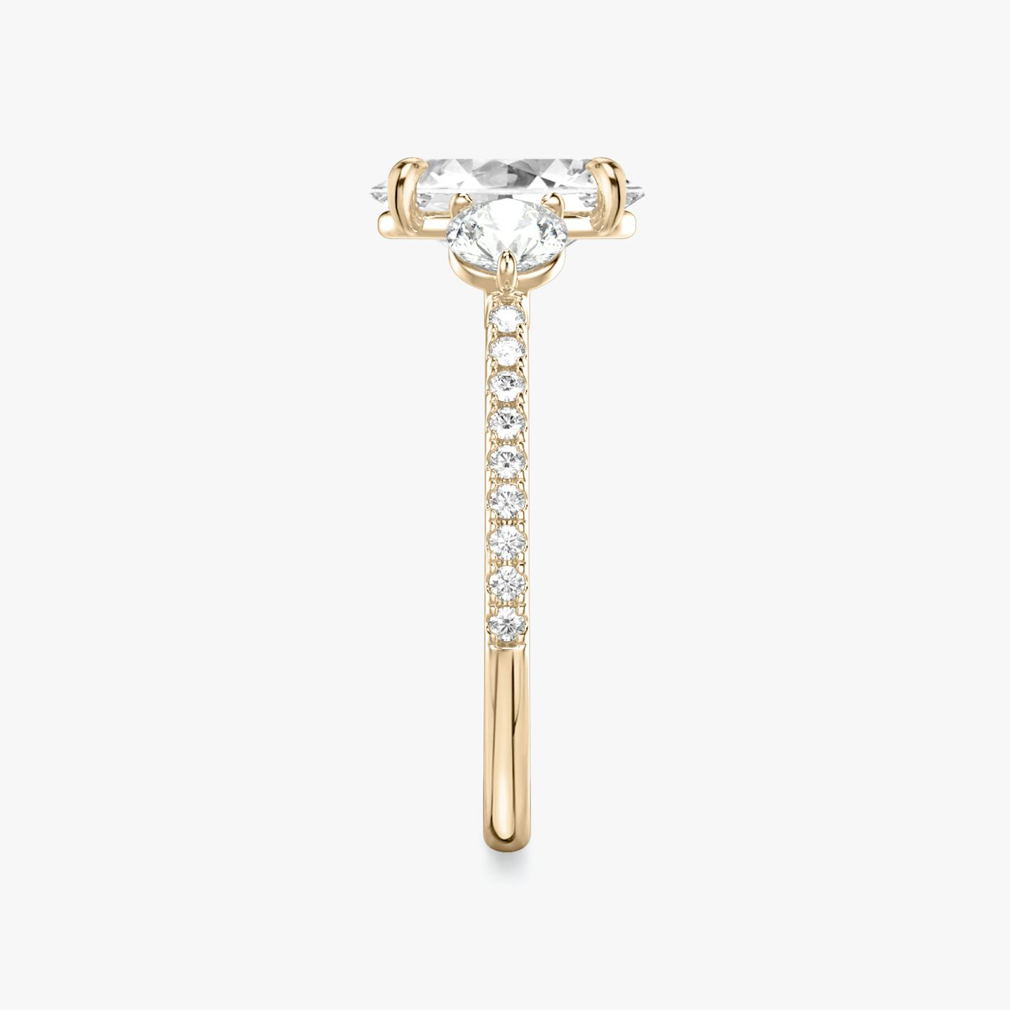 The Three Stone | Oval | 14k | 14k Rose Gold | Band: Pavé | Side stone carat: 1/4 | Side stone shape: Round Brilliant | Diamond orientation: vertical | Carat weight: See full inventory