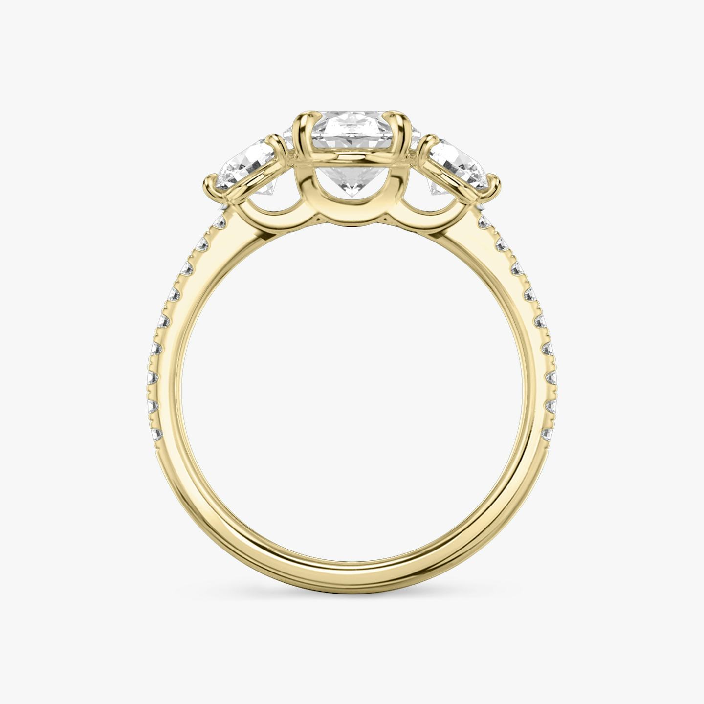 The Three Stone | Oval | 18k | 18k Yellow Gold | Band: Pavé | Side stone carat: 1/4 | Side stone shape: Round Brilliant | Diamond orientation: vertical | Carat weight: See full inventory