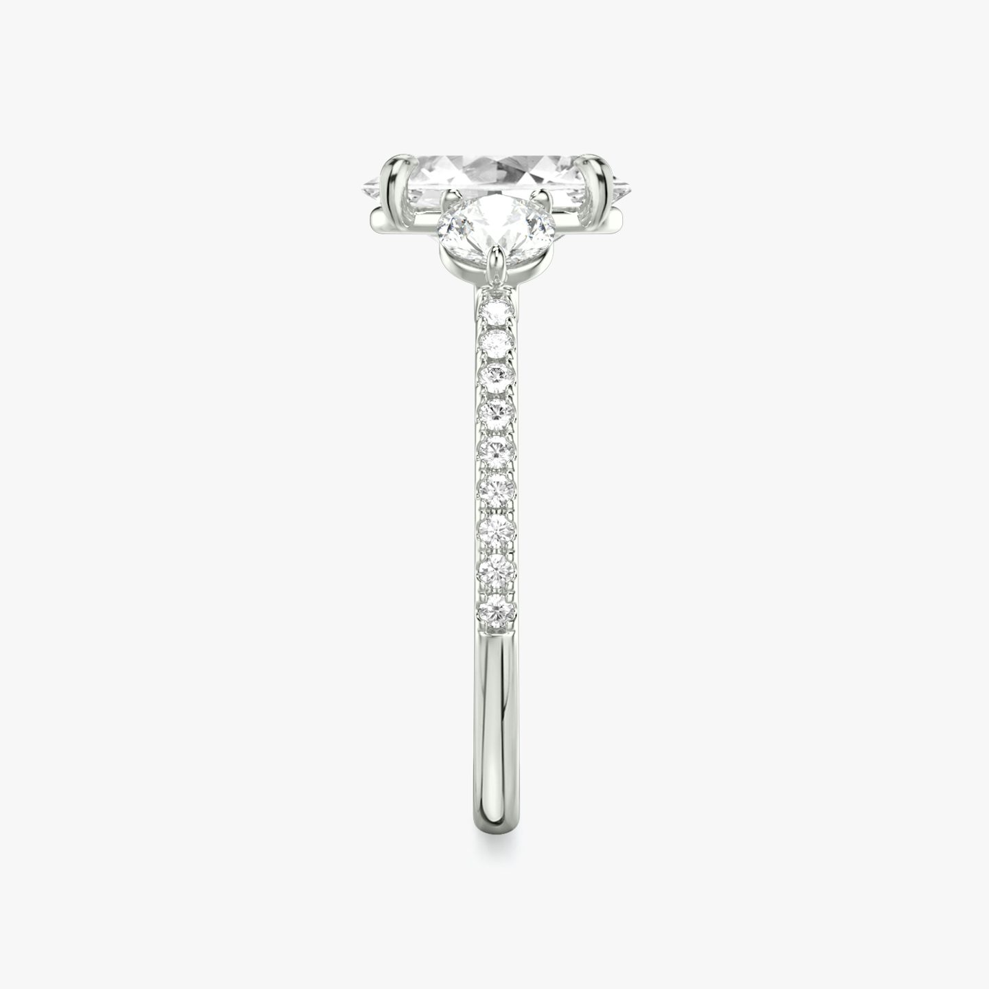 The Three Stone | Oval | 18k | 18k White Gold | Band: Pavé | Side stone carat: 1/4 | Side stone shape: Round Brilliant | Diamond orientation: vertical | Carat weight: See full inventory