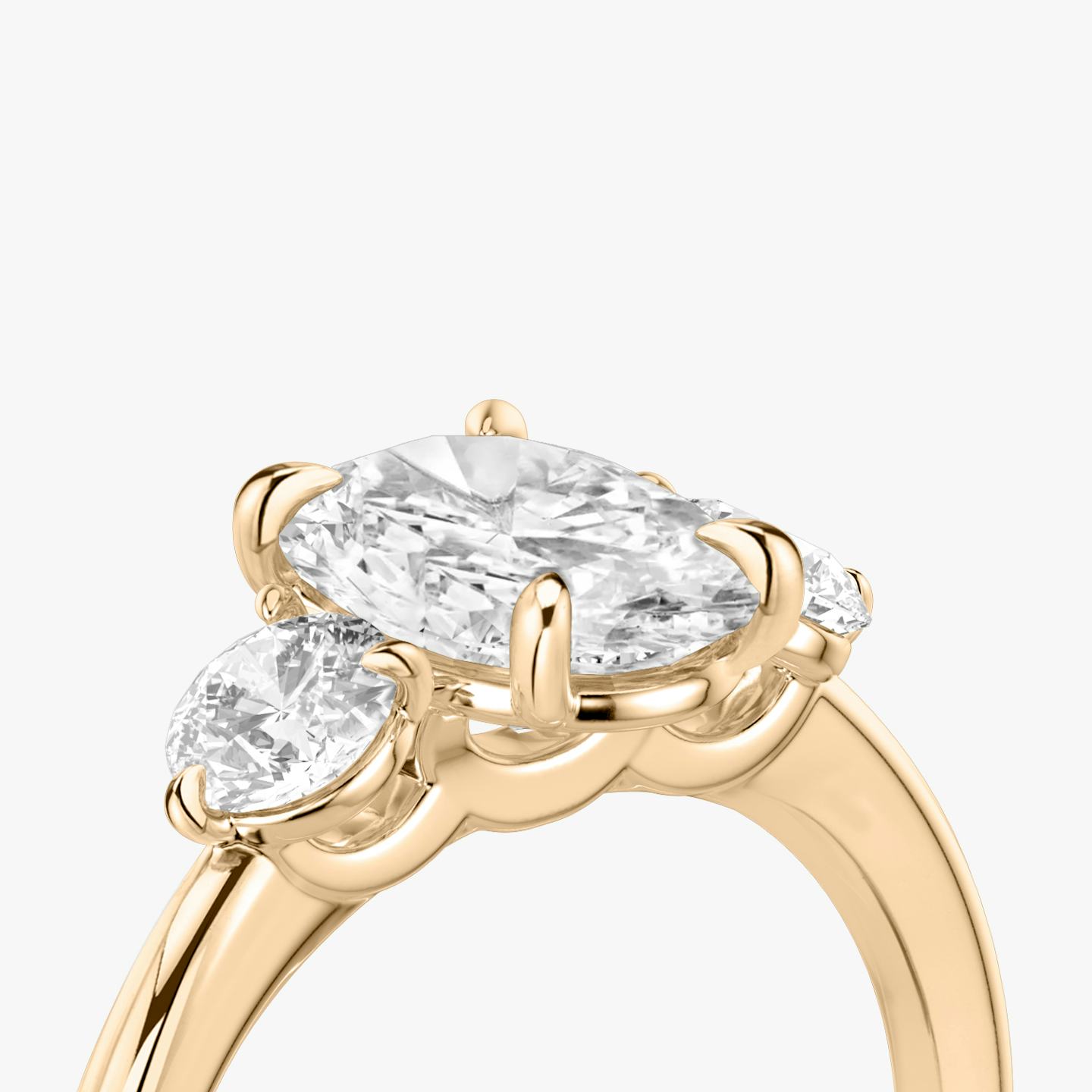 The Three Stone | Oval | 14k | 14k Rose Gold | Band: Plain | Side stone carat: 1/4 | Side stone shape: Round Brilliant | Diamond orientation: vertical | Carat weight: See full inventory