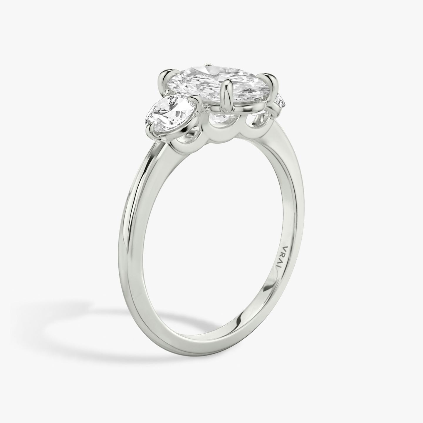 The Three Stone | Oval | 18k | 18k White Gold | Band: Plain | Side stone carat: 1/4 | Side stone shape: Round Brilliant | Diamond orientation: vertical | Carat weight: See full inventory