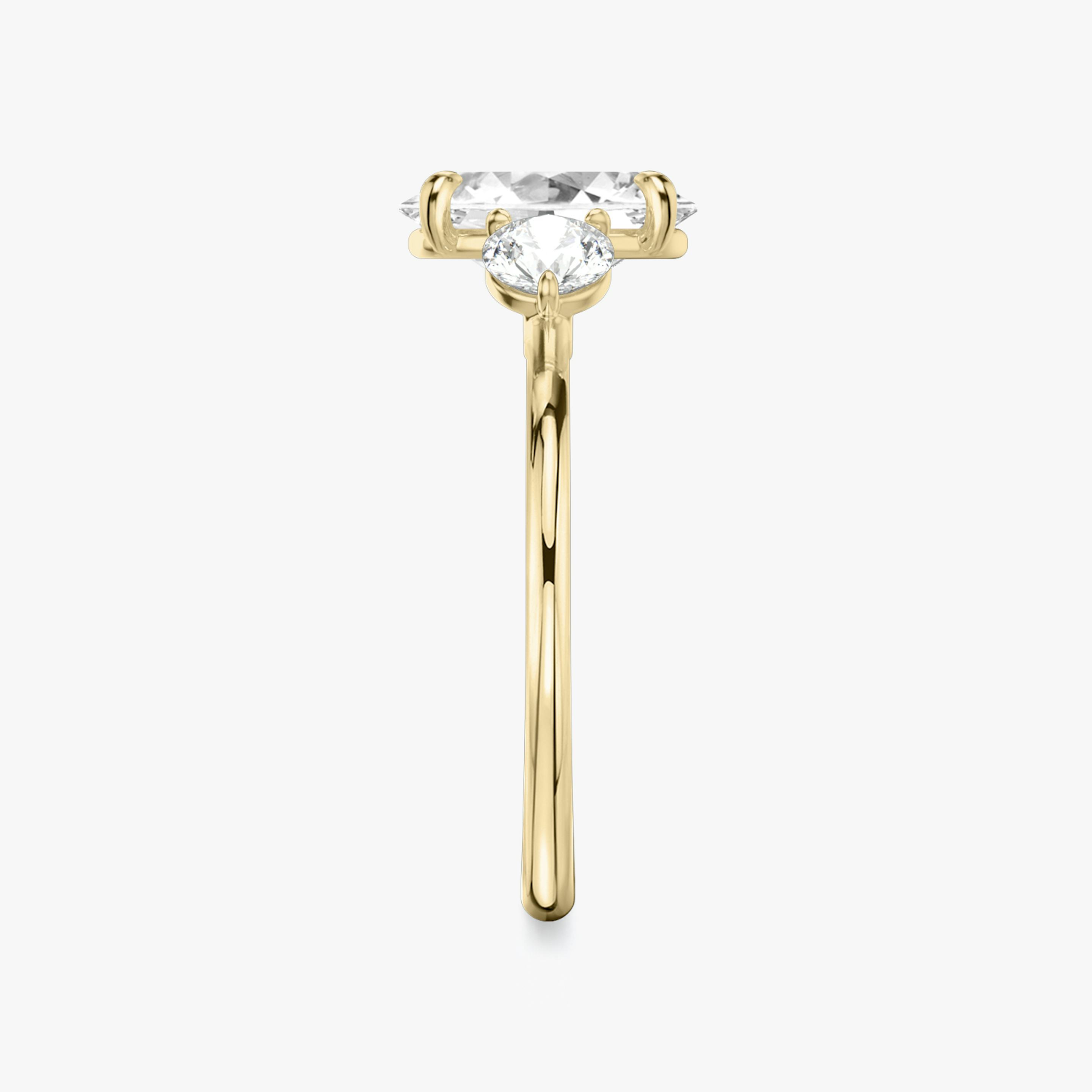 The Three Stone | Oval | 18k | 18k Yellow Gold | Band: Plain | Side stone carat: 1/4 | Side stone shape: Round Brilliant | Diamond orientation: vertical | Carat weight: See full inventory
