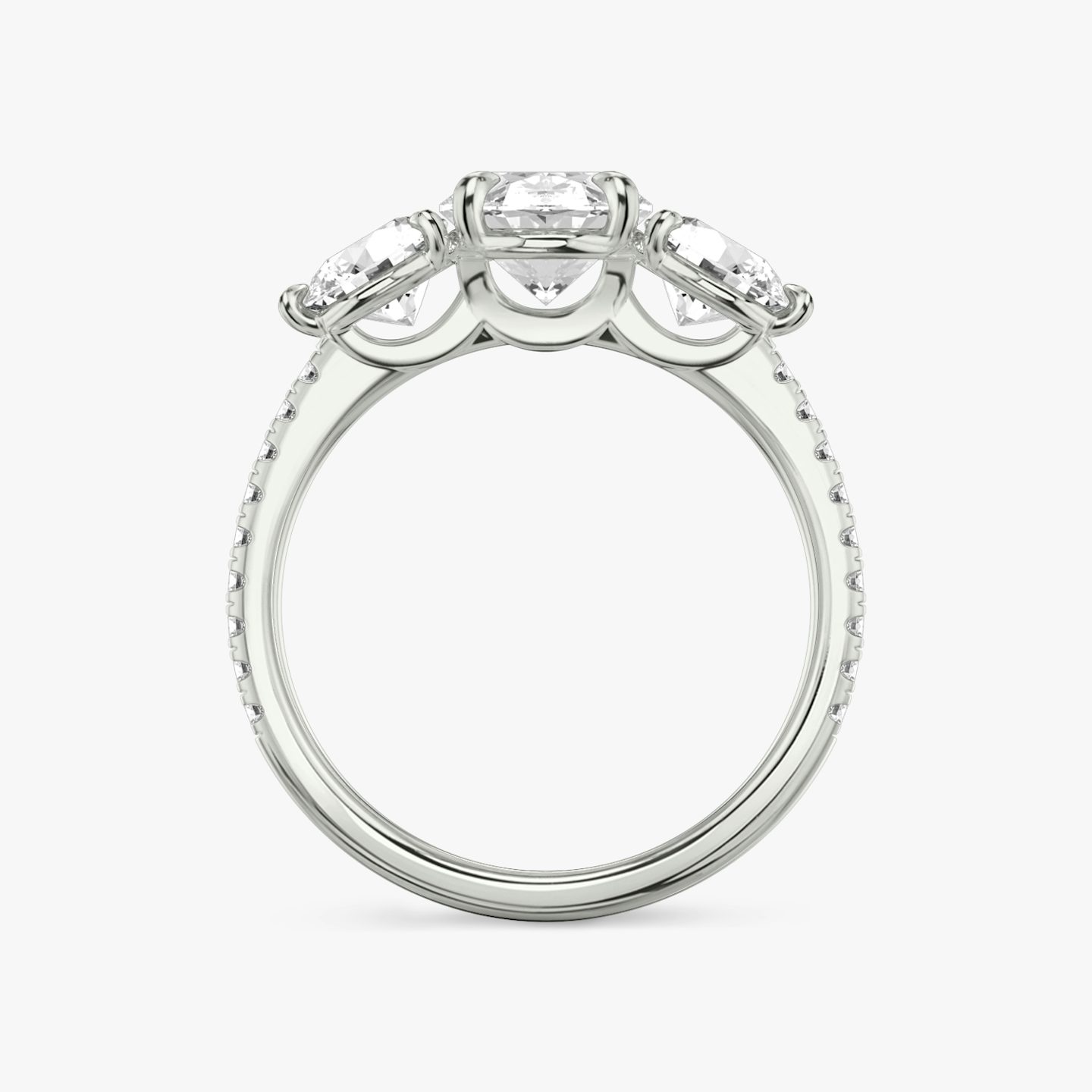 The Three Stone | Oval | Platinum | Band: Pavé | Side stone carat: 1/2 | Side stone shape: Round Brilliant | Diamond orientation: vertical | Carat weight: See full inventory
