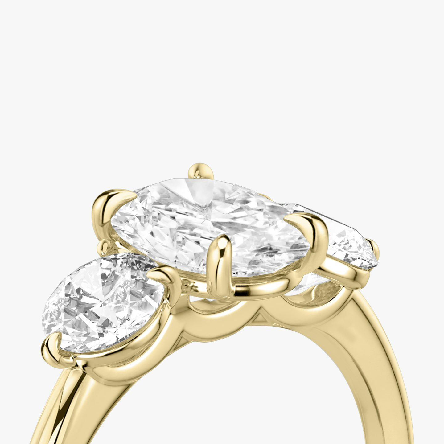 The Three Stone | Oval | 18k | 18k Yellow Gold | Band: Plain | Side stone carat: 1/2 | Side stone shape: Round Brilliant | Diamond orientation: vertical | Carat weight: See full inventory