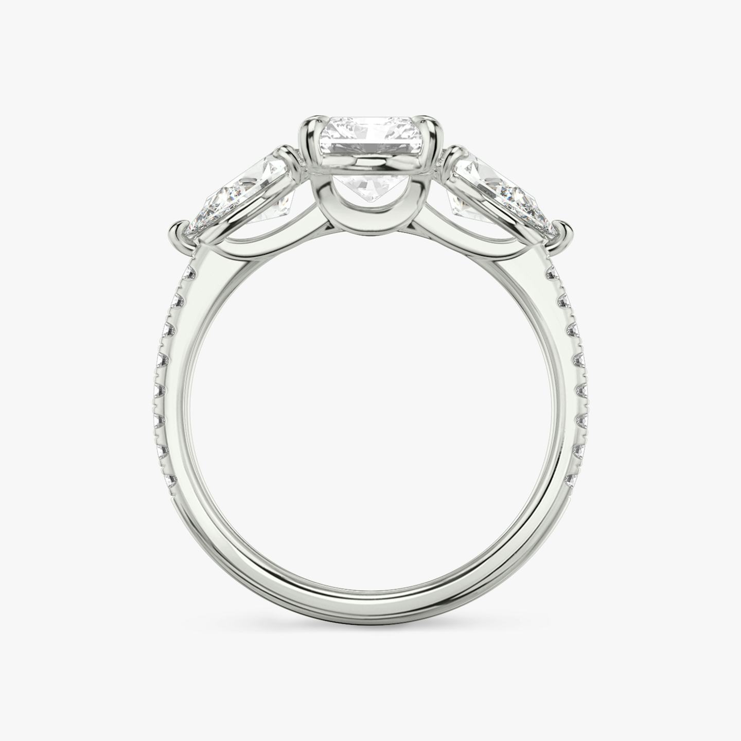 The Three Stone | Radiant | Platinum | Band: Pavé | Side stone carat: 1/2 | Side stone shape: Pear | Diamond orientation: vertical | Carat weight: See full inventory