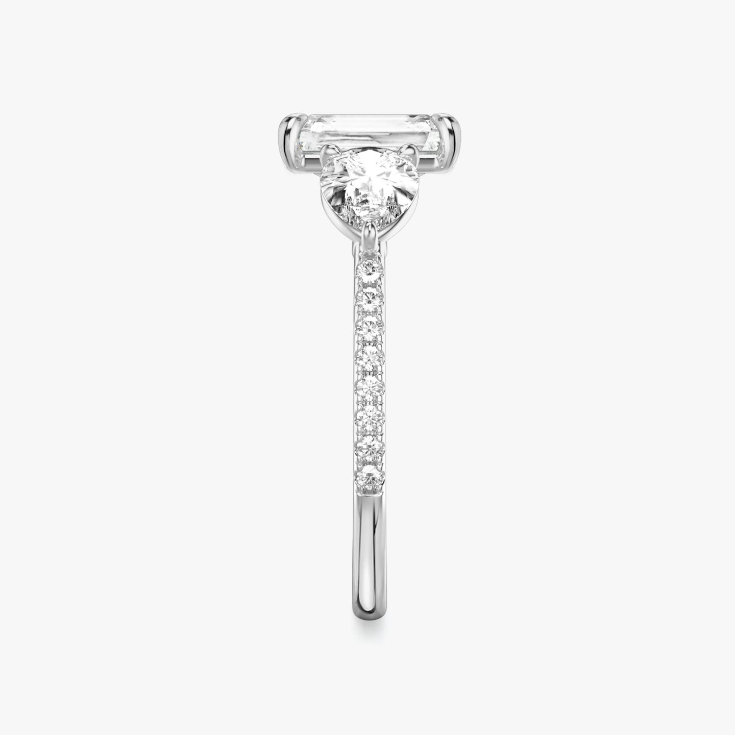 The Three Stone | Radiant | Platinum | Band: Pavé | Side stone carat: 1/2 | Side stone shape: Pear | Diamond orientation: vertical | Carat weight: See full inventory