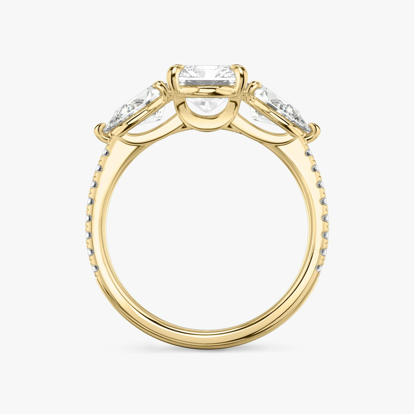 The Three Stone | Radiant | 18k | 18k Yellow Gold | Band: Pavé | Side stone carat: 1/2 | Side stone shape: Pear | Diamond orientation: vertical | Carat weight: See full inventory