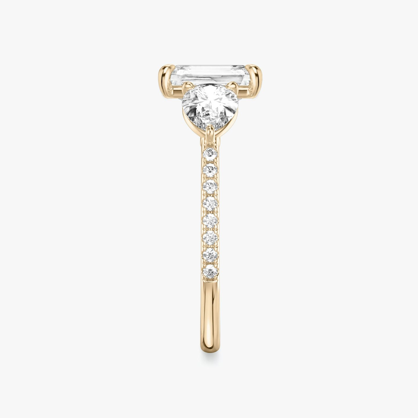 The Three Stone | Radiant | 14k | 14k Rose Gold | Band: Pavé | Side stone carat: 1/2 | Side stone shape: Pear | Diamond orientation: vertical | Carat weight: See full inventory