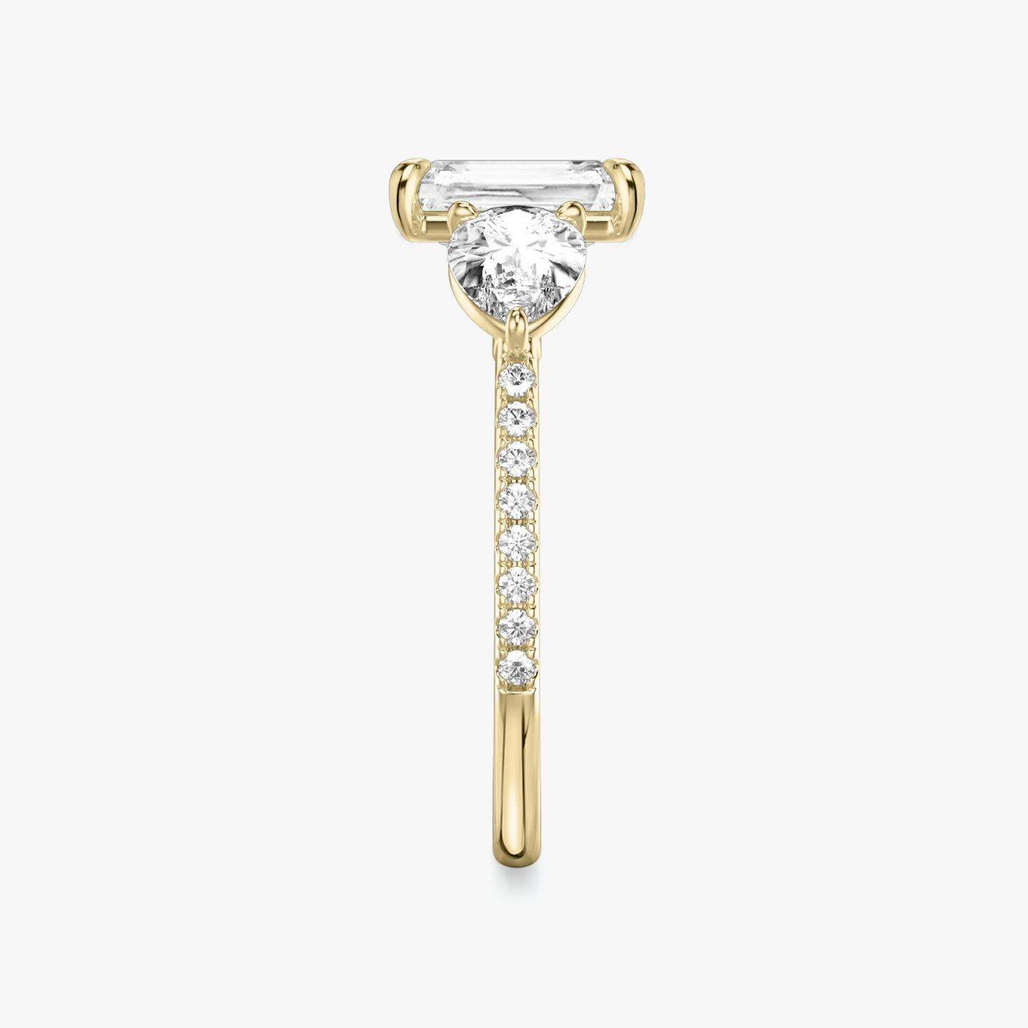 The Three Stone | Radiant | 18k | 18k Yellow Gold | Band: Pavé | Side stone carat: 1/2 | Side stone shape: Pear | Diamond orientation: vertical | Carat weight: See full inventory