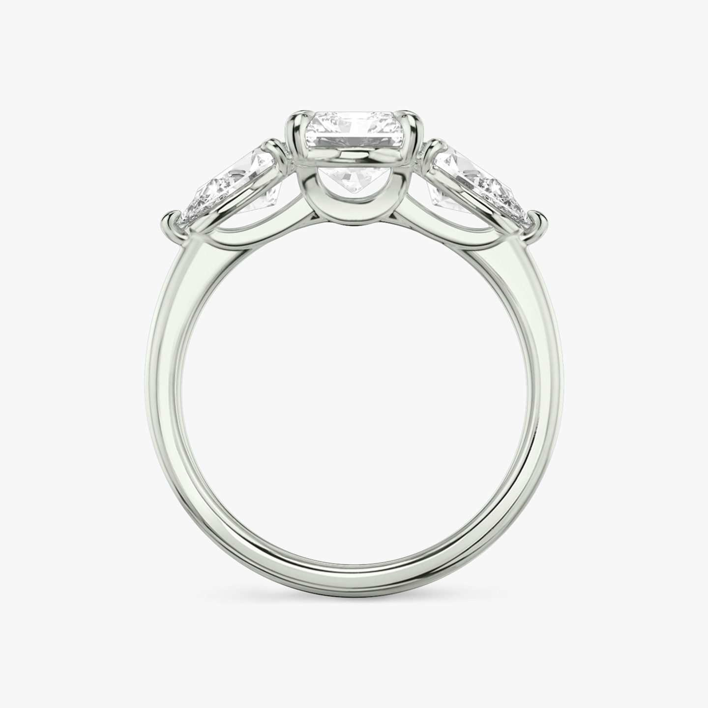 The Three Stone | Radiant | 18k | 18k White Gold | Band: Plain | Side stone carat: 1/2 | Side stone shape: Pear | Diamond orientation: vertical | Carat weight: See full inventory
