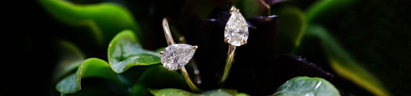 The pear signature engagement ring with yellow gold band