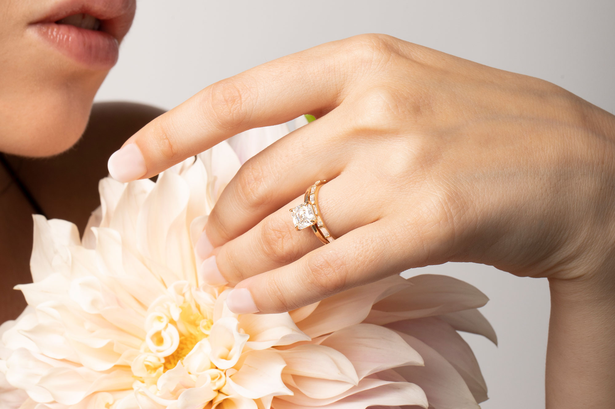 The signature asscher engagement ring with yellow gold band