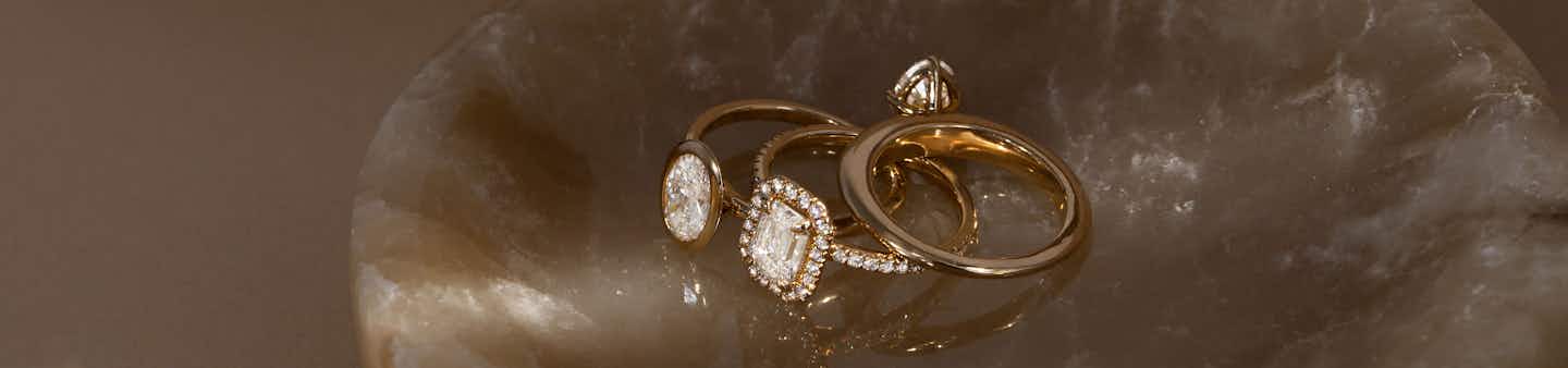 signature solitaire yellow gold engagement ring, halo yellow gold engagement ring