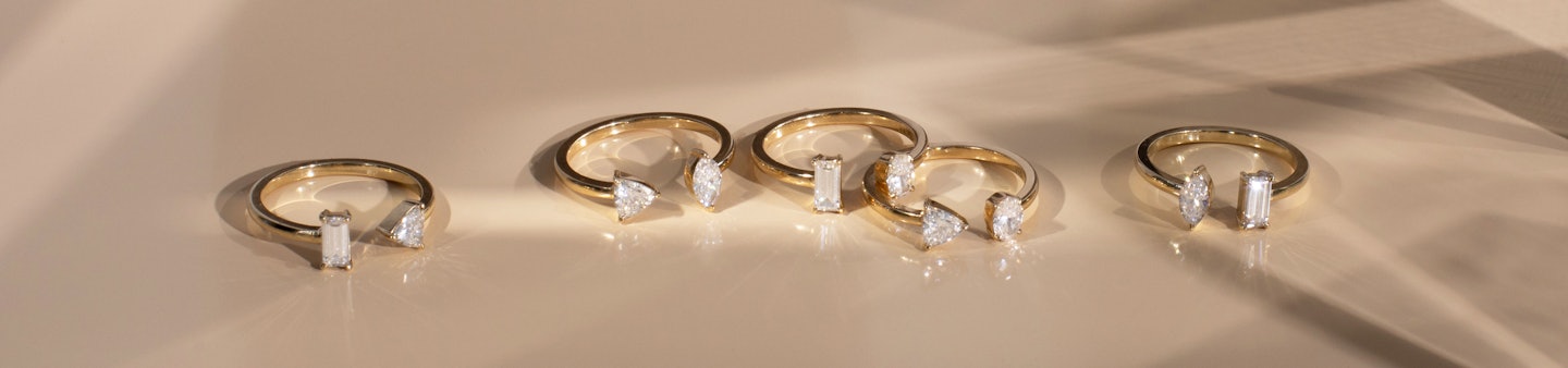 Mixed Cuff Rings with yellow gold bands 