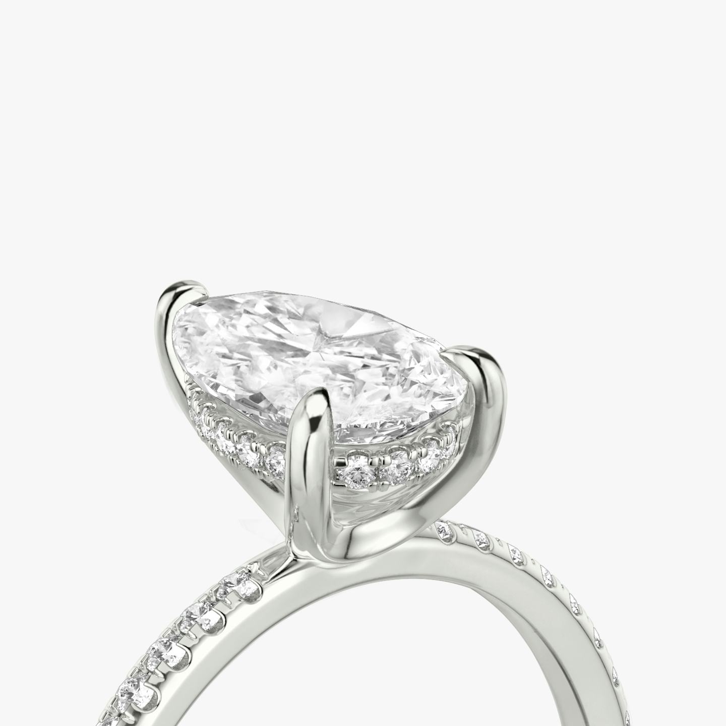 The Classic Hidden Halo | Pear | Platinum | Band: Pavé | Prong style: Plain | Diamond orientation: vertical | Carat weight: See full inventory
