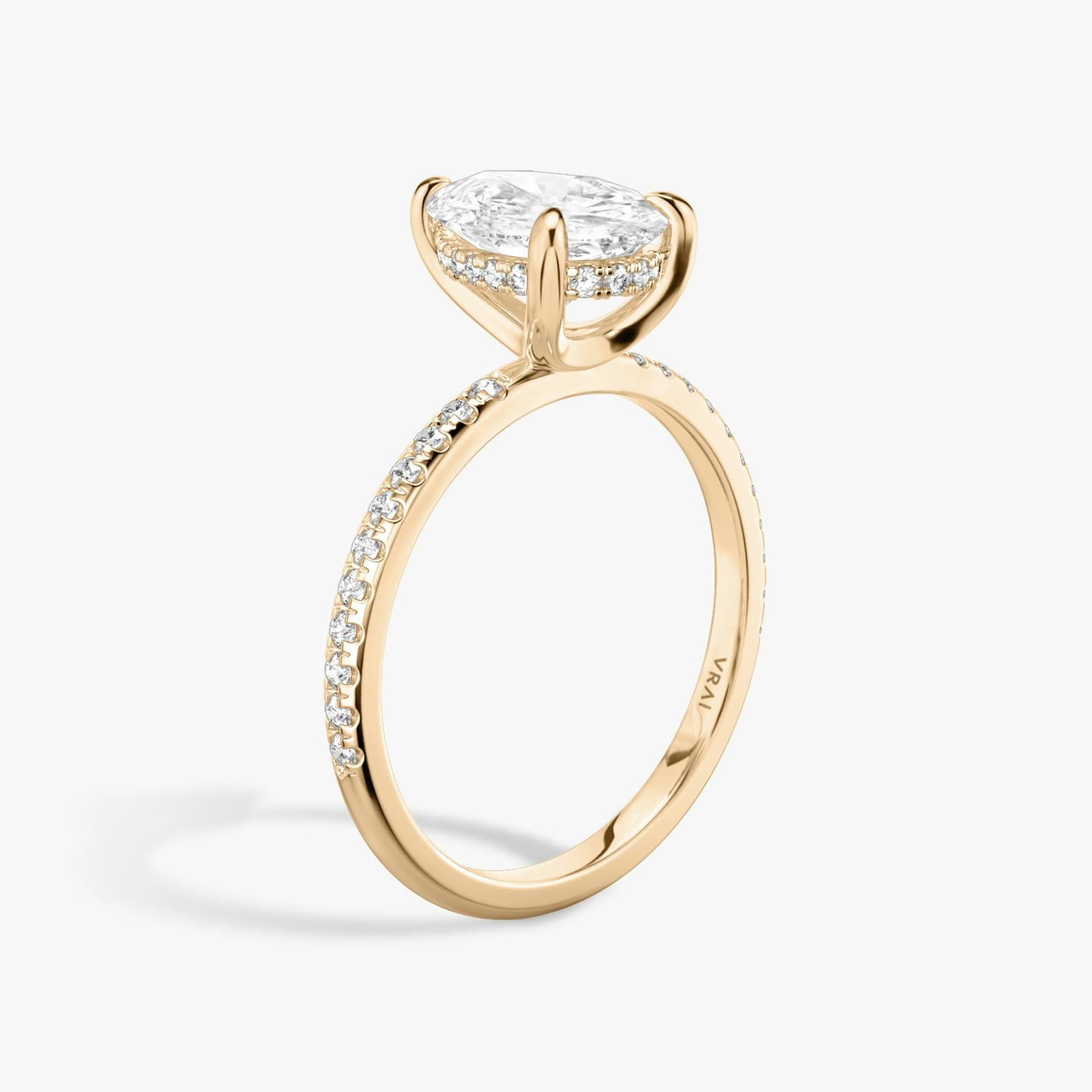 The Classic Hidden Halo | Pear | 14k | 14k Rose Gold | Band: Pavé | Prong style: Plain | Diamond orientation: vertical | Carat weight: See full inventory