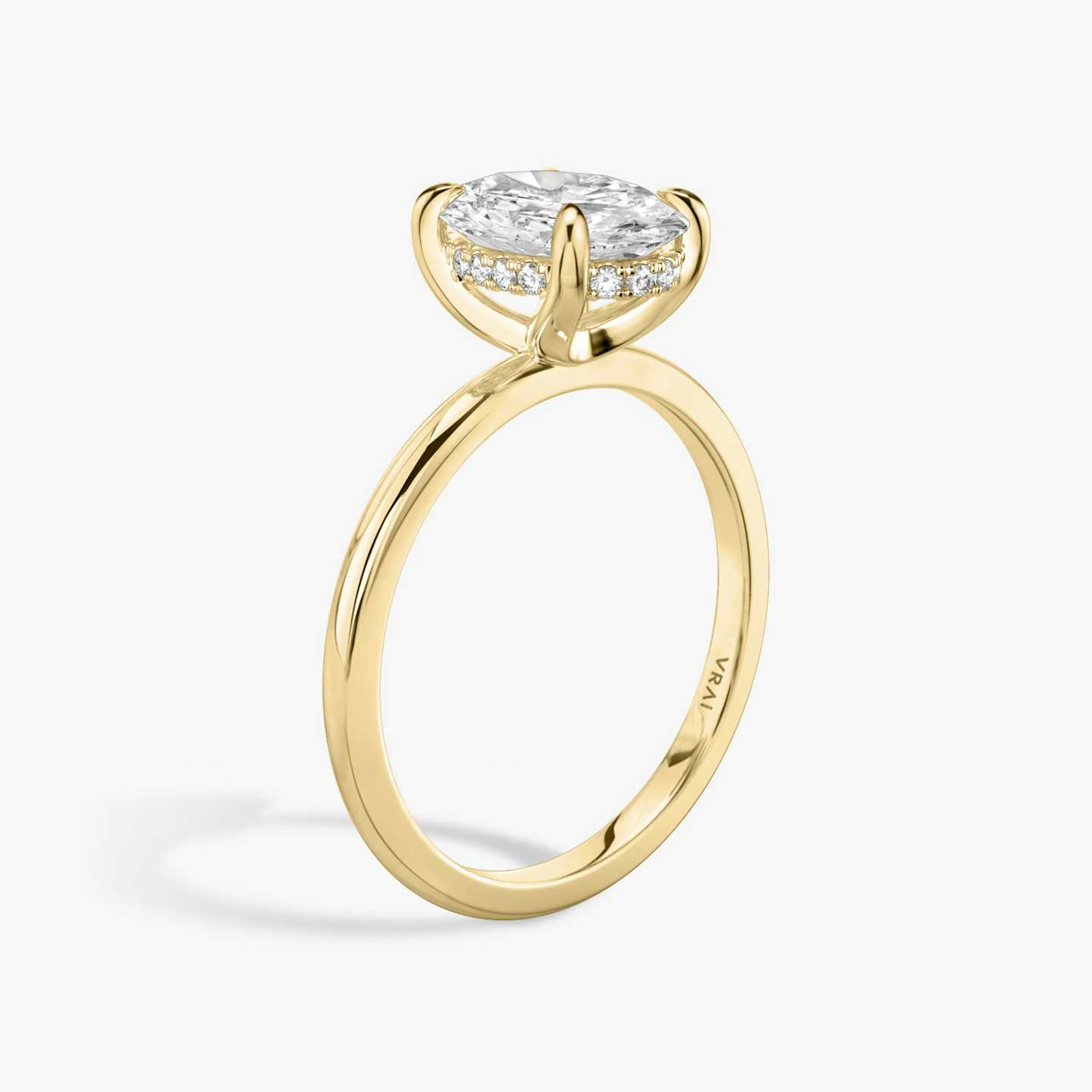 Hidden Halo oval yellow gold engagement ring
