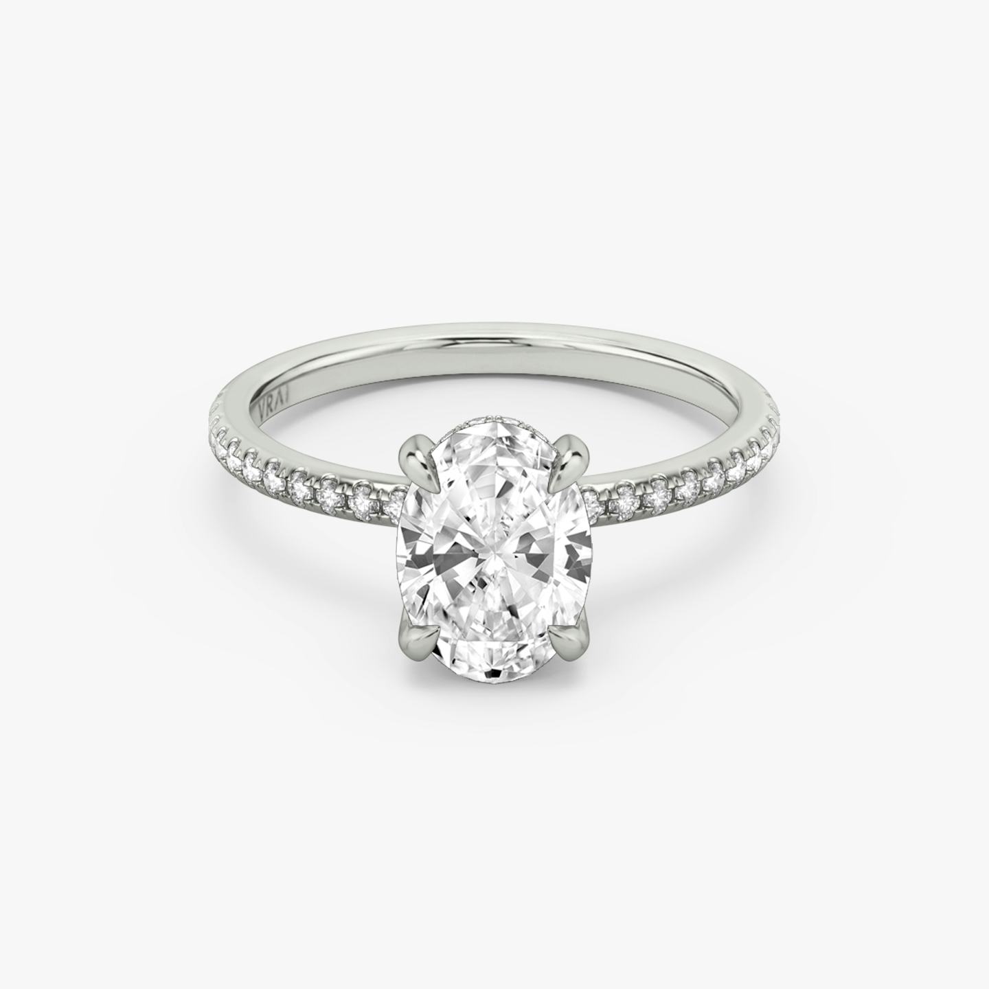 The Classic Hidden Halo | Oval | Platinum | Band: Pavé | Prong style: Plain | Diamond orientation: vertical | Carat weight: See full inventory