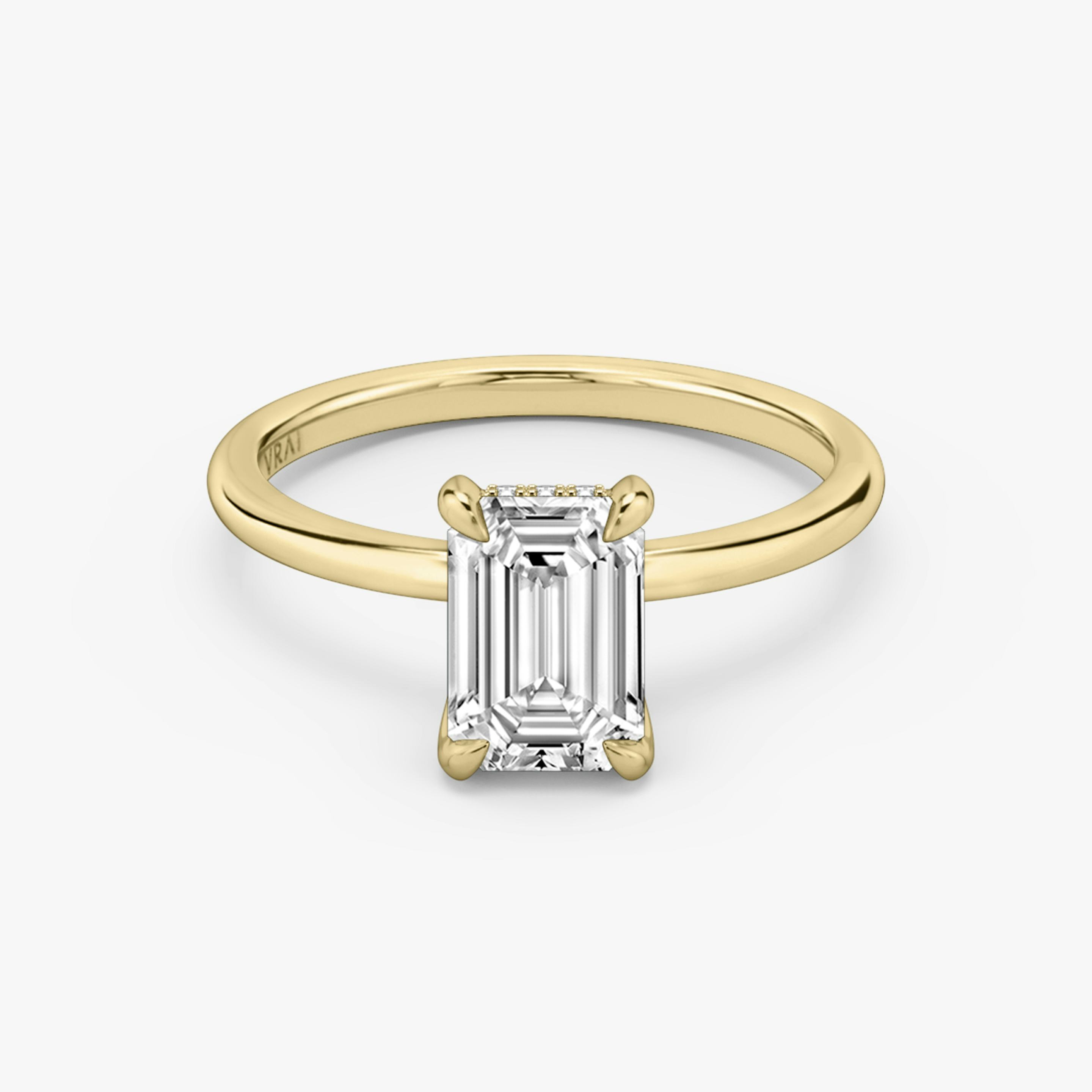 The Classic Hidden Halo | Emerald | 18k | 18k Yellow Gold | Band: Plain | Prong style: Plain | Diamond orientation: vertical | Carat weight: See full inventory