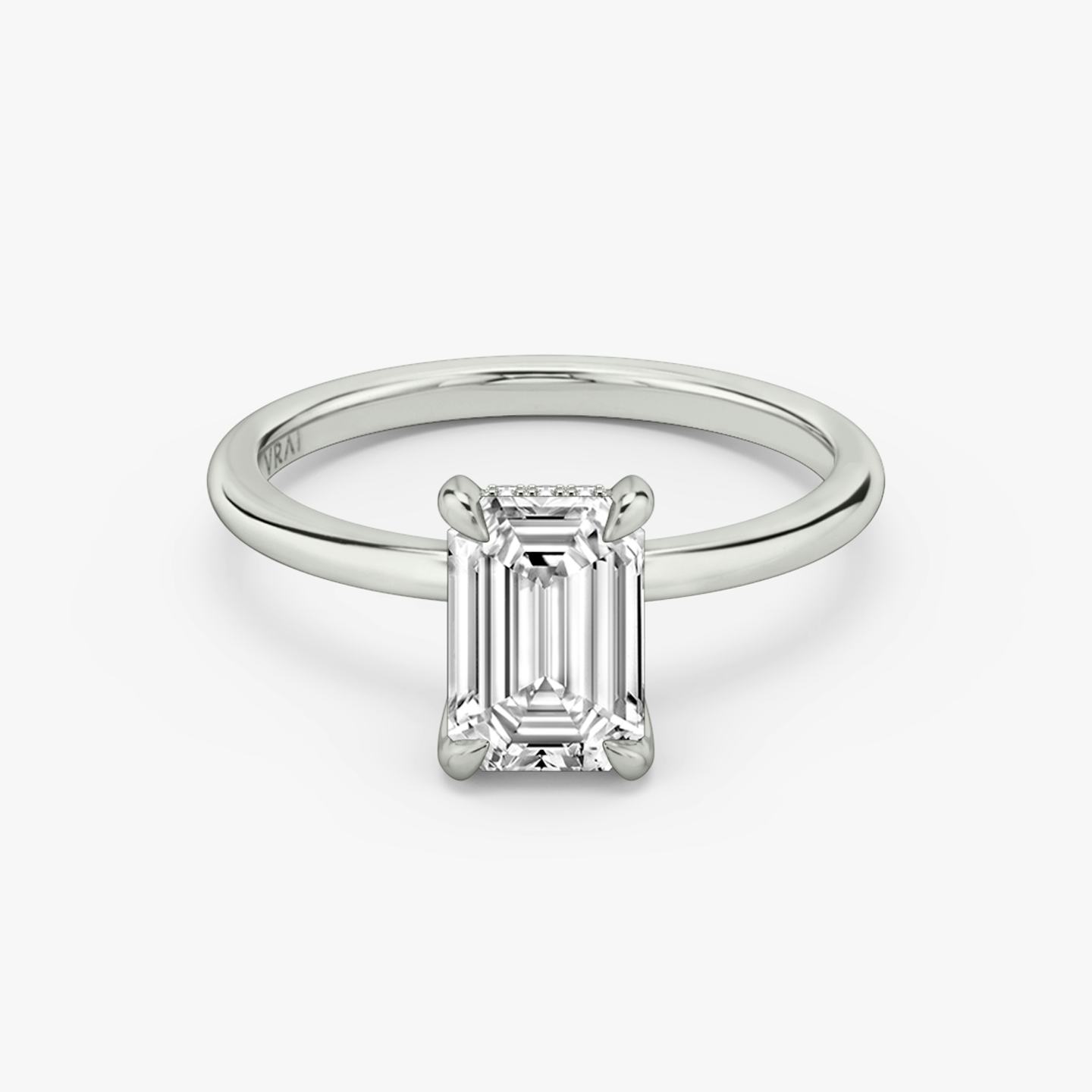 The Classic Hidden Halo | Emerald | 18k | 18k White Gold | Band: Plain | Prong style: Plain | Diamond orientation: vertical | Carat weight: See full inventory